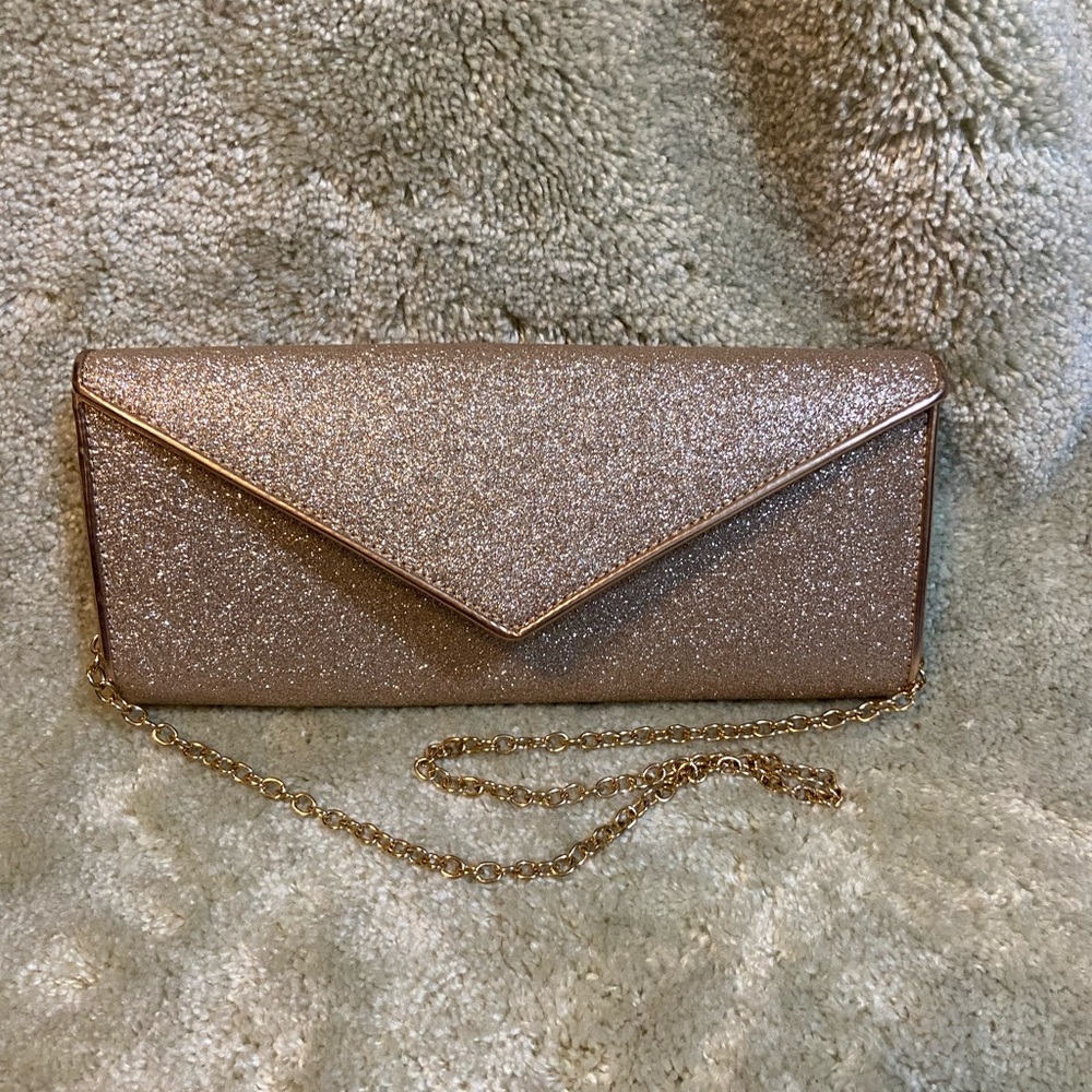 Gold glitter formal handbag.